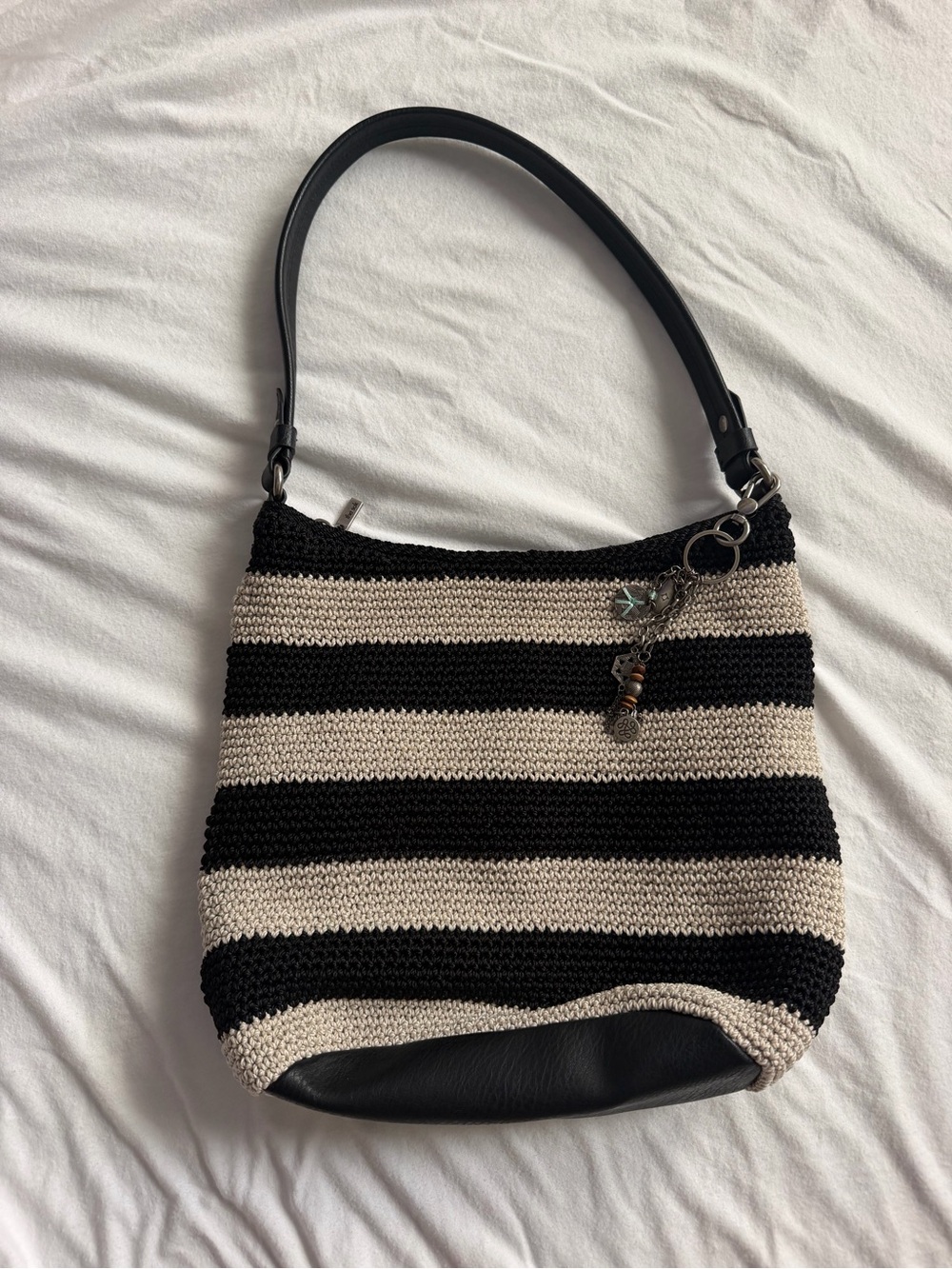 Striped Black and Cream Crochet Shoulder Bag with Charm Detail